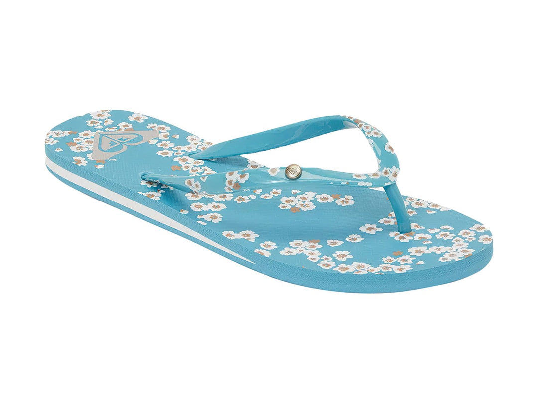 Sandalias tipo flip-flop color turquesa con tira estampada y detalle de línea blanca en la suela.