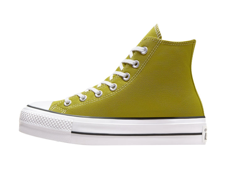 Tenis Converse de bota color verde oliva con suela de plataforma blanca y cordones blancos.