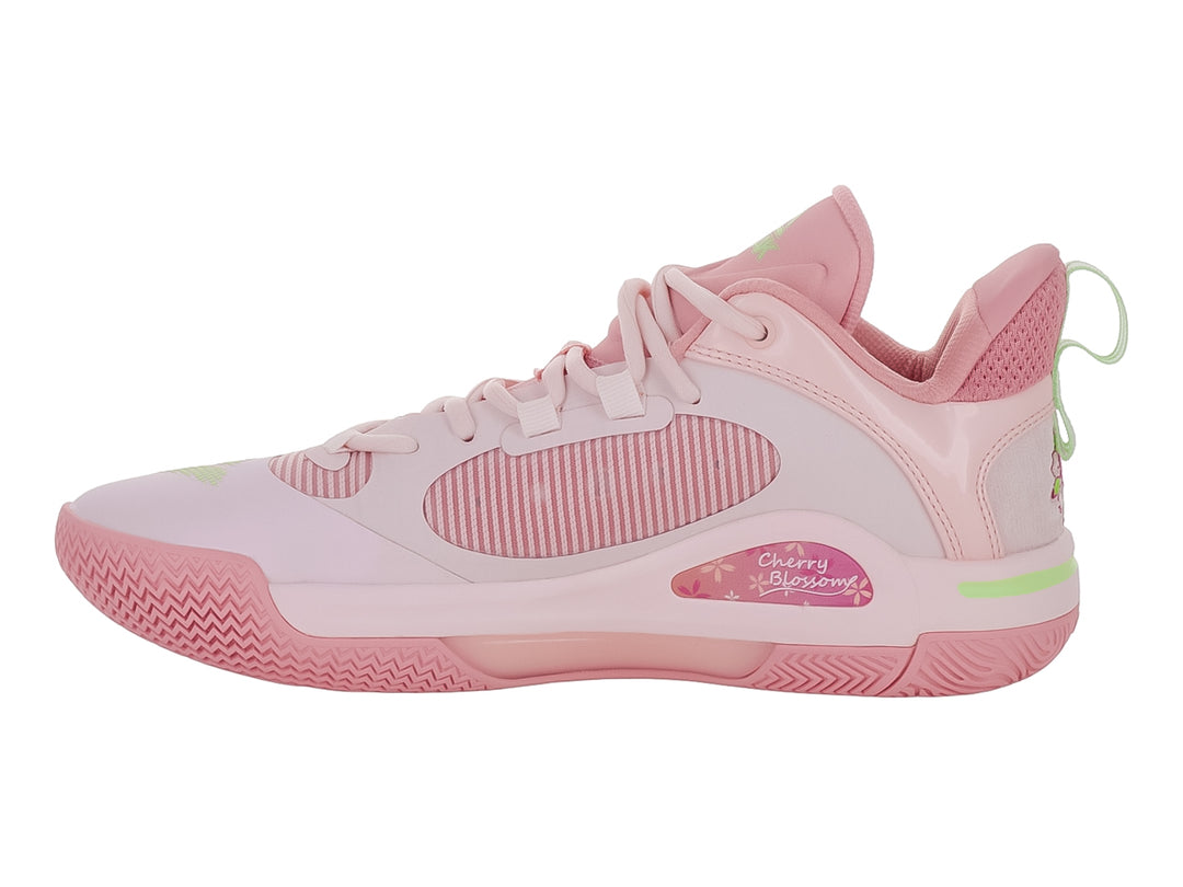 Tenis de baloncesto marca PEAK en color rosa con detalles en verde neón, vista lateral.