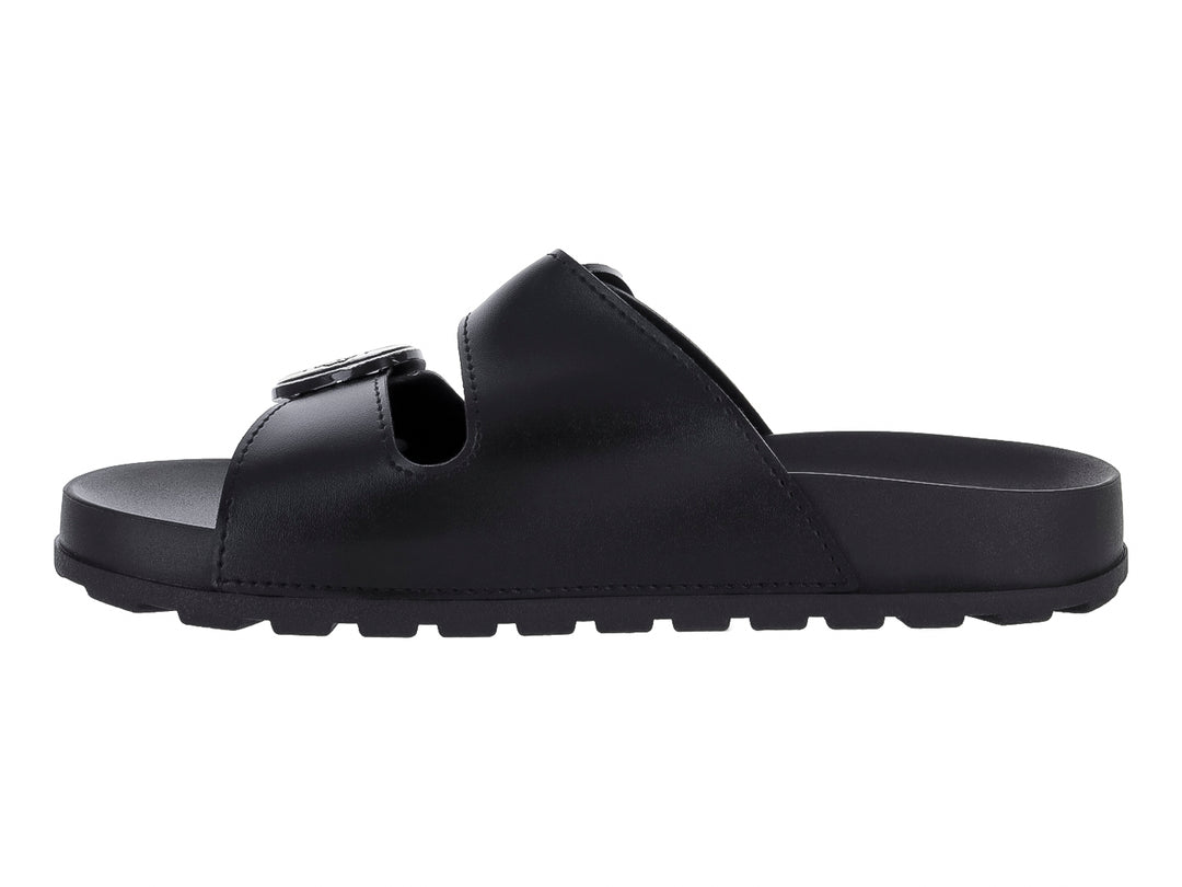 Sandalias negras para mujer con dos hebillas decorativas plateadas.