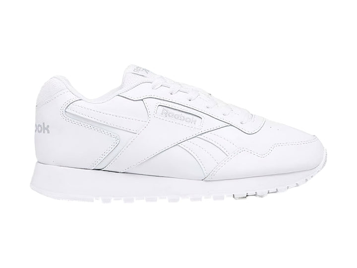 Tenis deportivos Reebok de color blanco con suela blanca y diseño clásico.