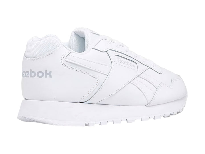 Tenis deportivos Reebok de color blanco con suela blanca y diseño clásico.