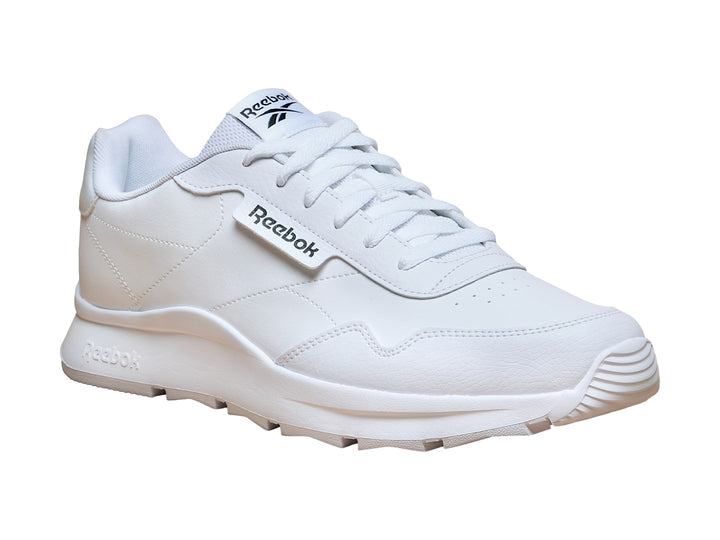 Tenis deportivos Reebok de color blanco con suela blanca y detalles minimalistas.