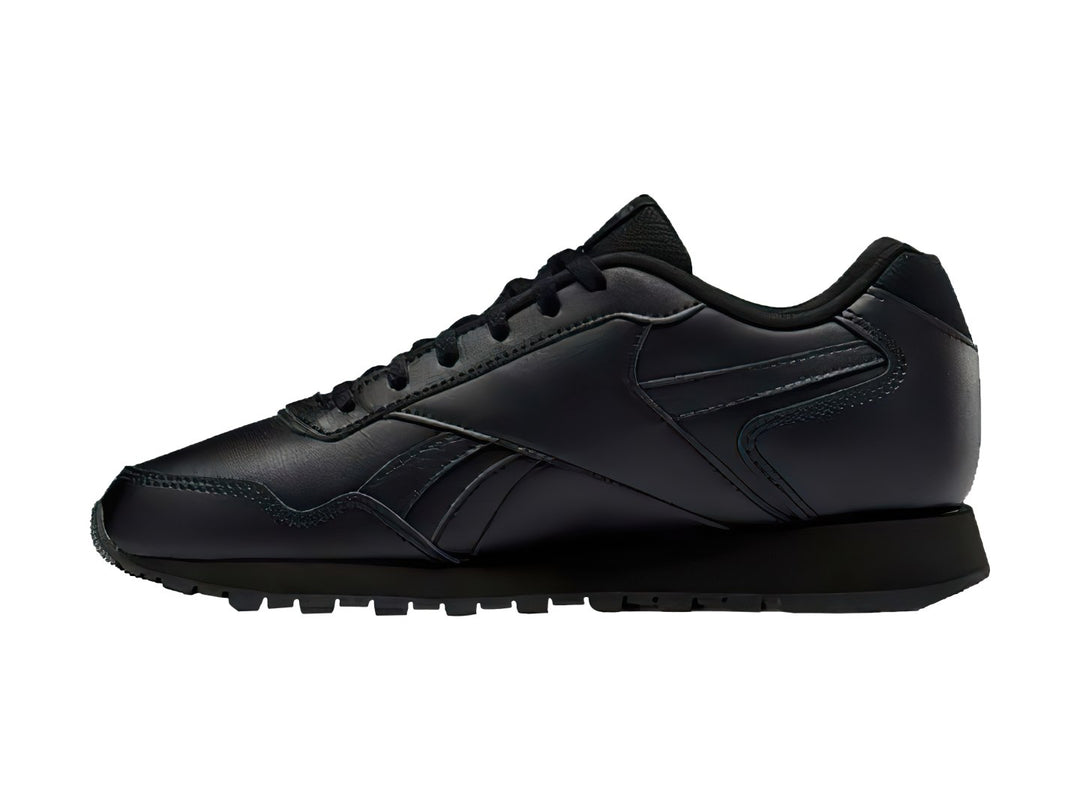 Tenis deportivos Reebok Glide 22 en color negro total con suela texturizada y agujetas negras.