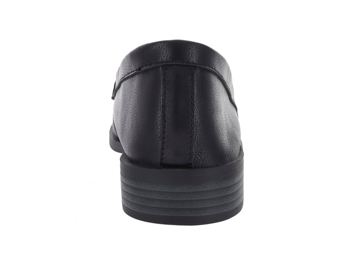 Zapato tipo mocasín color negro para mujer con detalle de borlas y herraje dorado en la parte superior.