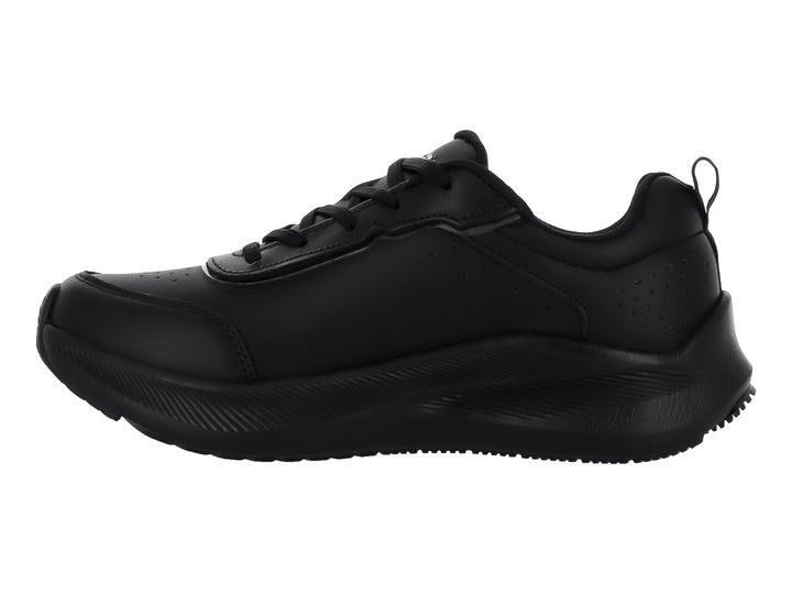 Tenis deportivos color negro con logotipo blanco y suela gruesa.