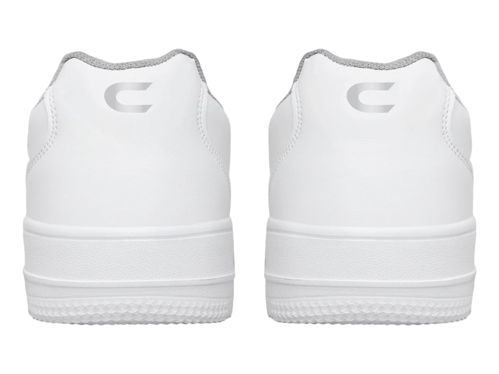 Tenis deportivos blancos con cierre de velcro y suela blanca.