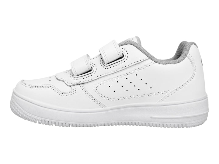 Tenis deportivos blancos con cierre de velcro y suela blanca.