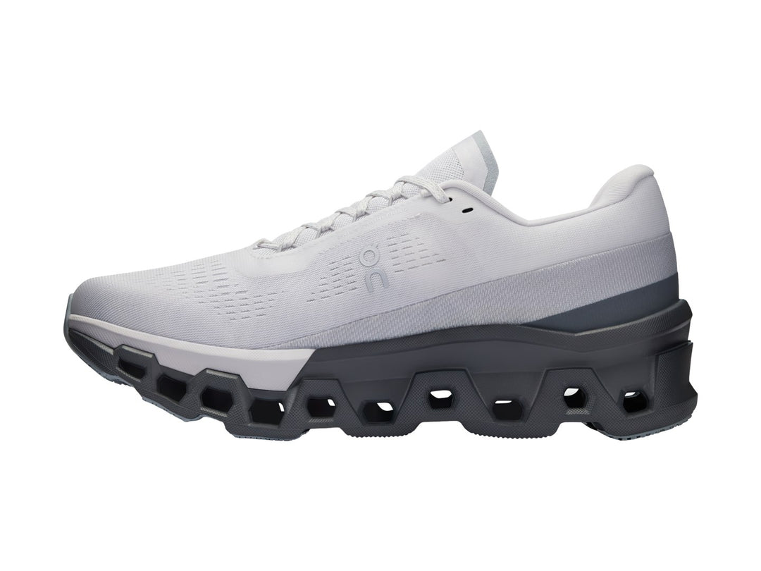 Tenis deportivos ON Cloudmonster 2 color Frost Rock con suela gris oscuro y malla gris claro.