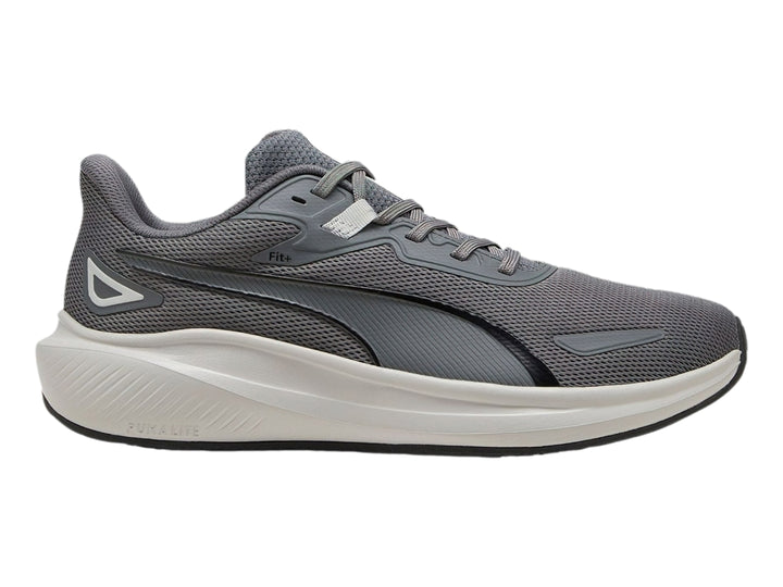 Tenis deportivos PUMA Skyrocket Lite en color gris oscuro y gris claro con suela blanca.