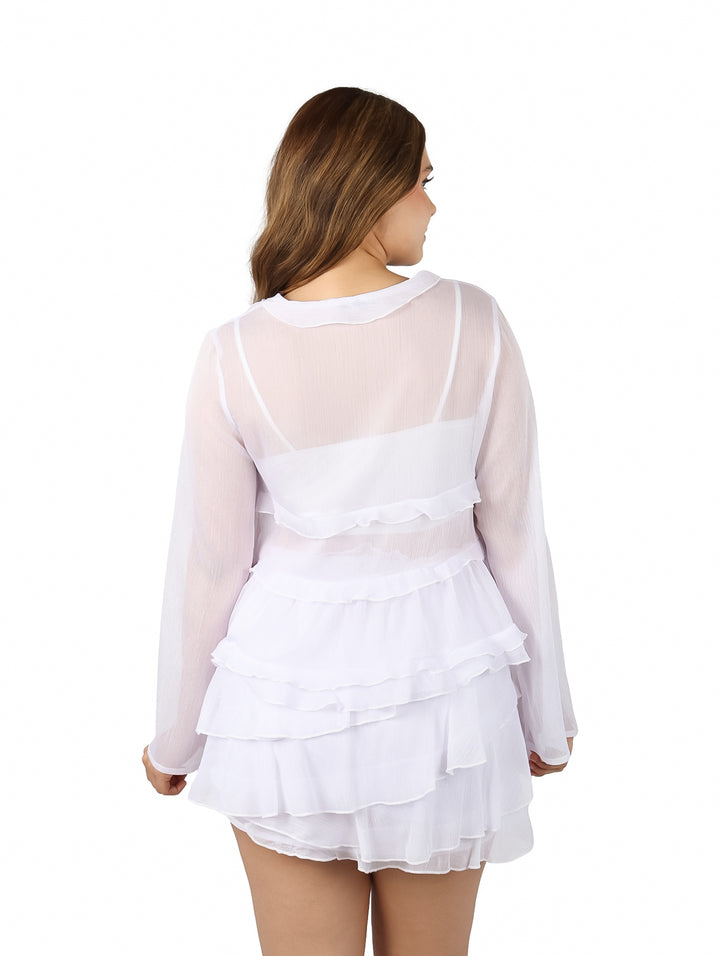 Blusa de maternidad color ivory en organza con mangas largas, volantes y cierre de lazo frontal.