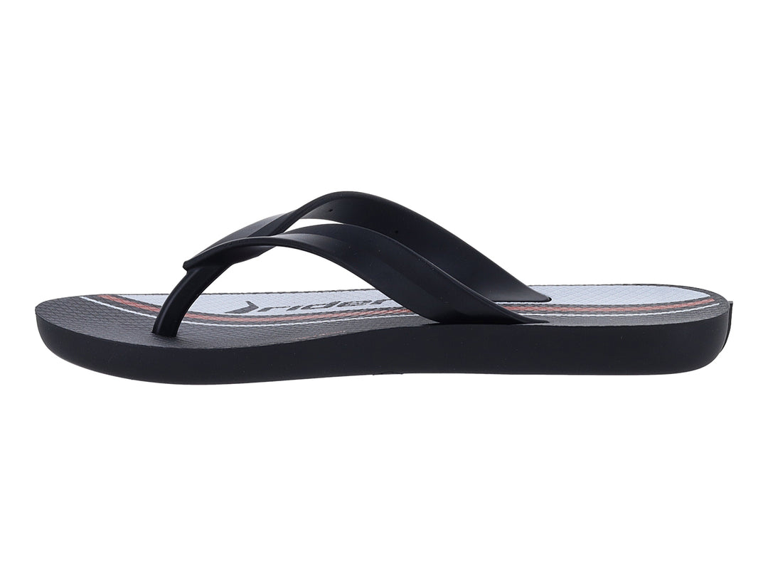 Sandalias Rider infantiles color negro con detalle blanco y logo rojo, estilo urban thong.