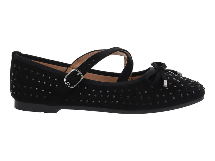Zapato plano negro sintético para niña con correa, hebilla plateada, moño y detalles de tachuelas brillantes.