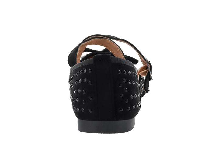 Zapato plano negro sintético para niña con correa, hebilla plateada, moño y detalles de tachuelas brillantes.
