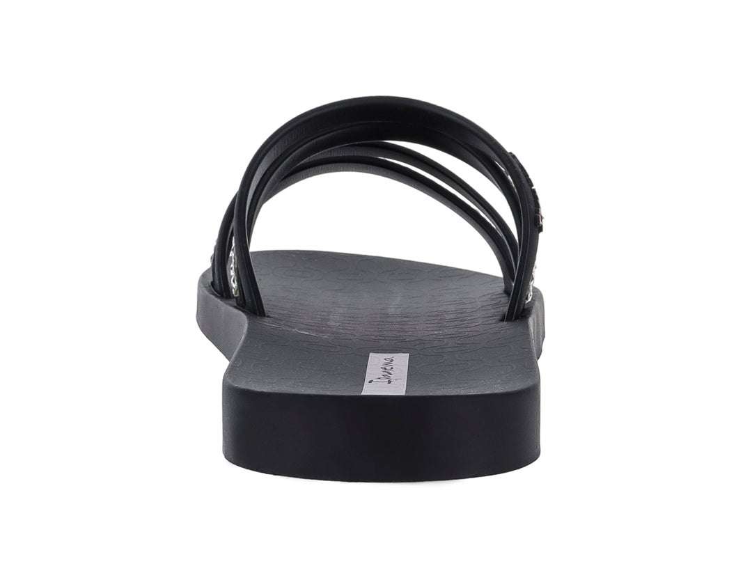 Sandalia Ipanema color negro con tiras decoradas con brillantes plateados para mujer.