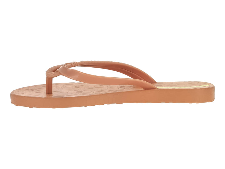 Sandalias tipo flip-flop de color nude con detalles en amarillo.