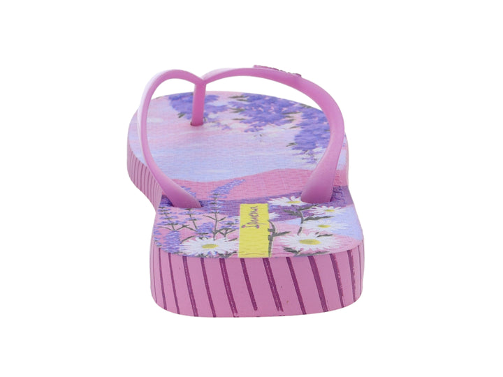Sandalias Ipanema de color rosa con estampado floral morado y amarillo, con laterales a rayas rosas.