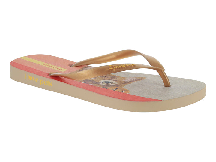 Sandalias Ipanema color beige y rosa con estampado de mascota y correas doradas.