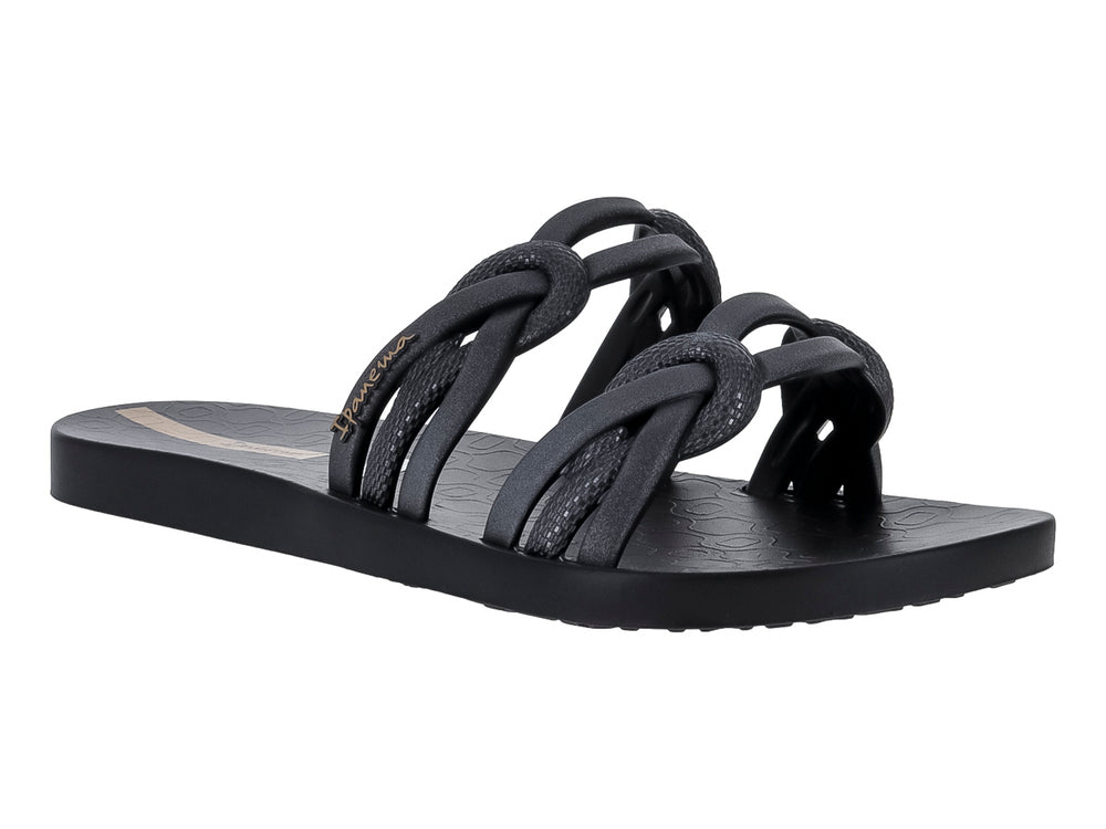 Sandalia slide Ipanema color negro y plata con correas entrelazadas en forma de nudo.