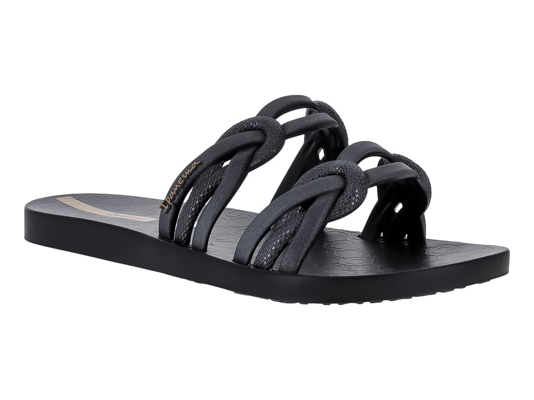 Sandalia slide Ipanema color negro y plata con correas entrelazadas en forma de nudo.