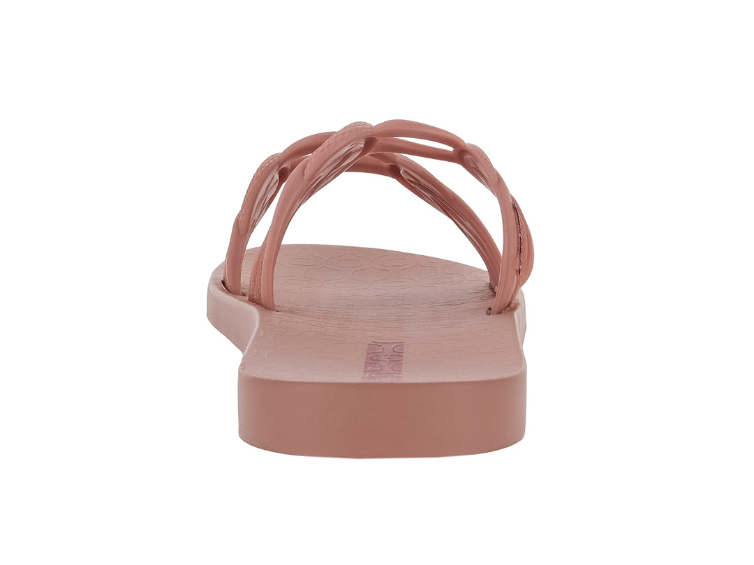 Sandalia plana Ipanema color rosa bronce con tiras anchas decoradas con nudos.