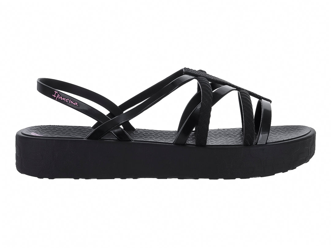 Sandalias Ipanema negras de plataforma con tiras cruzadas y suela gruesa.
