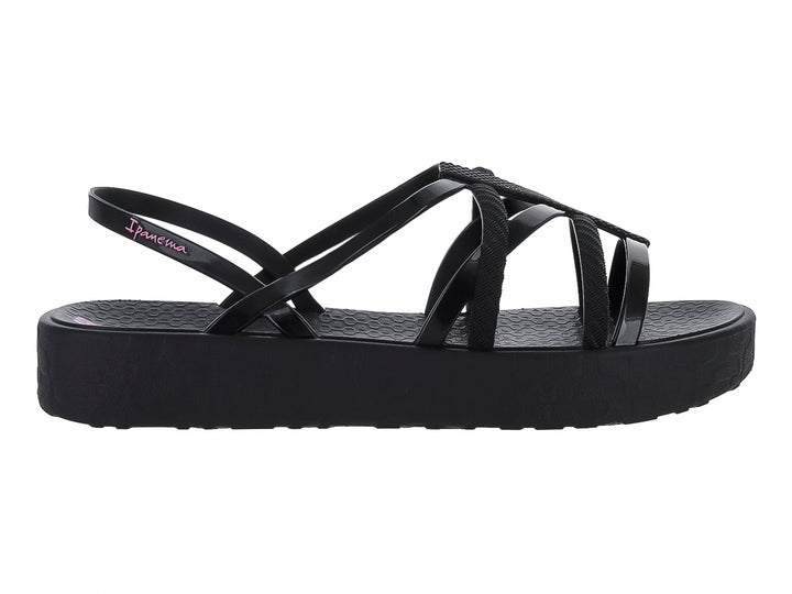 Sandalias Ipanema negras de plataforma con tiras cruzadas y suela gruesa.