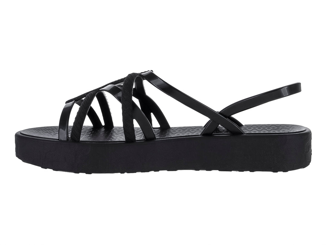 Sandalias Ipanema negras de plataforma con tiras cruzadas y suela gruesa.