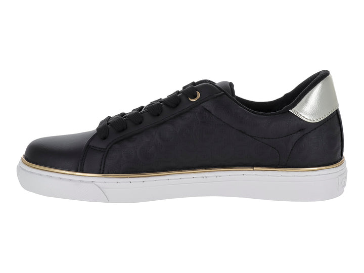 Tenis negros GBG con suela blanca, detalles en dorado y plateado, diseño casual para mujer.