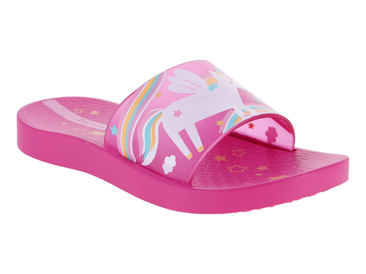 Sandalia slide rosa para niños con estampado de unicornio multicolor en la banda.