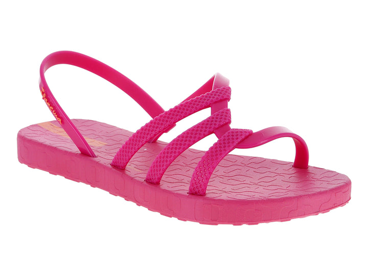 Sandalia infantil Ipanema de color rosa con tiras transversales y detalle en naranja.