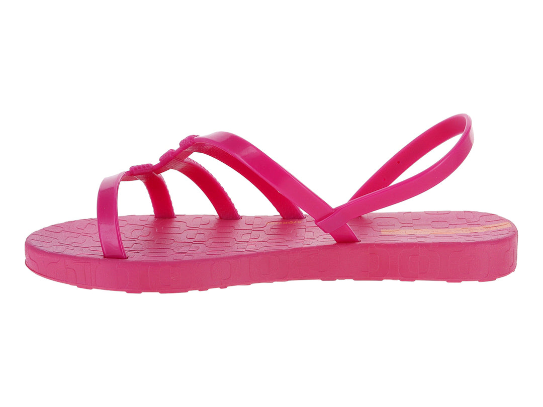 Sandalia infantil Ipanema de color rosa con tiras transversales y detalle en naranja.