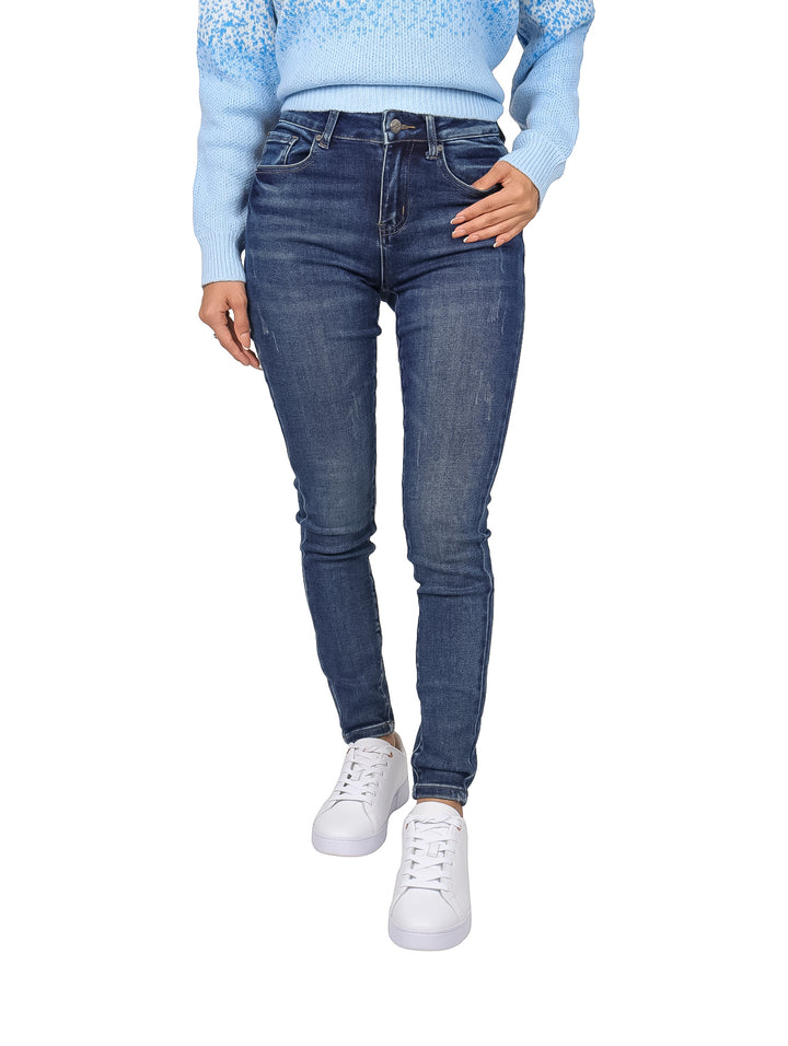 Pantalones jeans skinny color azul oscuro con detalles de desgaste para mujer.