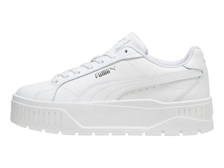 Tenis PUMA Carmen II L en color blanco con suela de plataforma gruesa y detalles en plata.