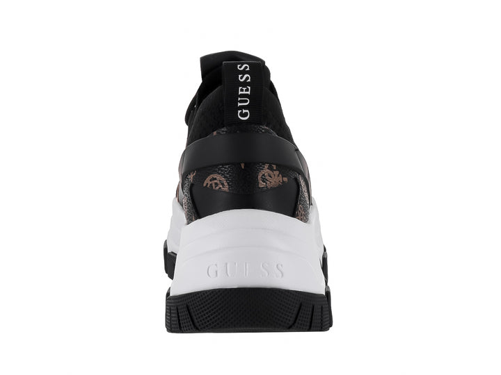 Tenis Guess chunky color negro y blanco con detalles en marrón y suela de plataforma.