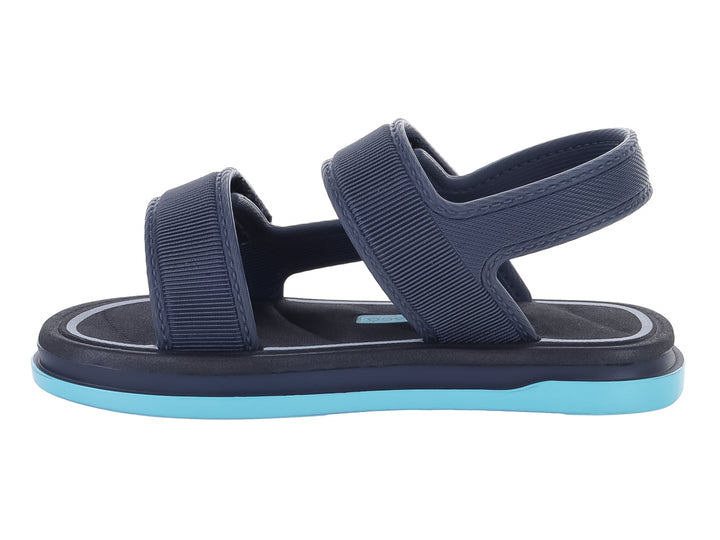 Sandalia infantil Cartago color gris oscuro con suela azul claro y correas ajustables.