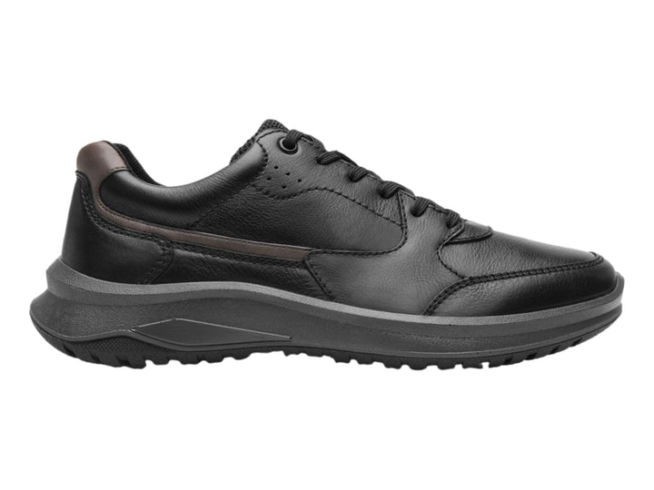 Zapato casual Flexi color negro con detalles en marrón y suela gruesa oscura.