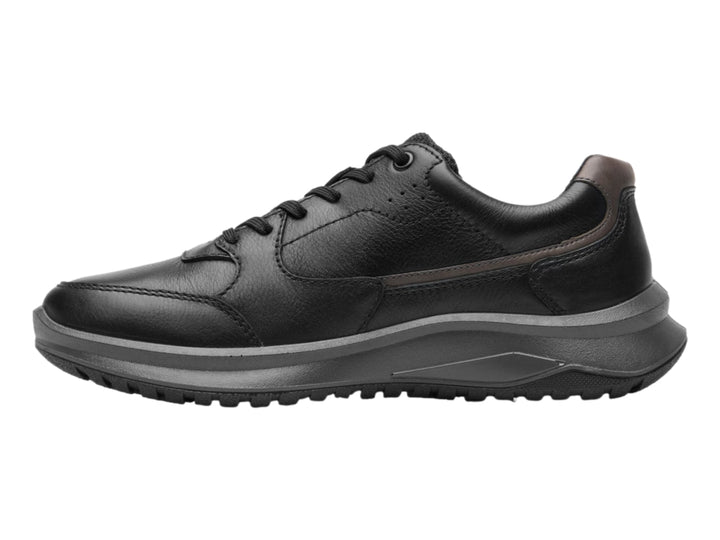Zapato casual Flexi color negro con detalles en marrón y suela gruesa oscura.