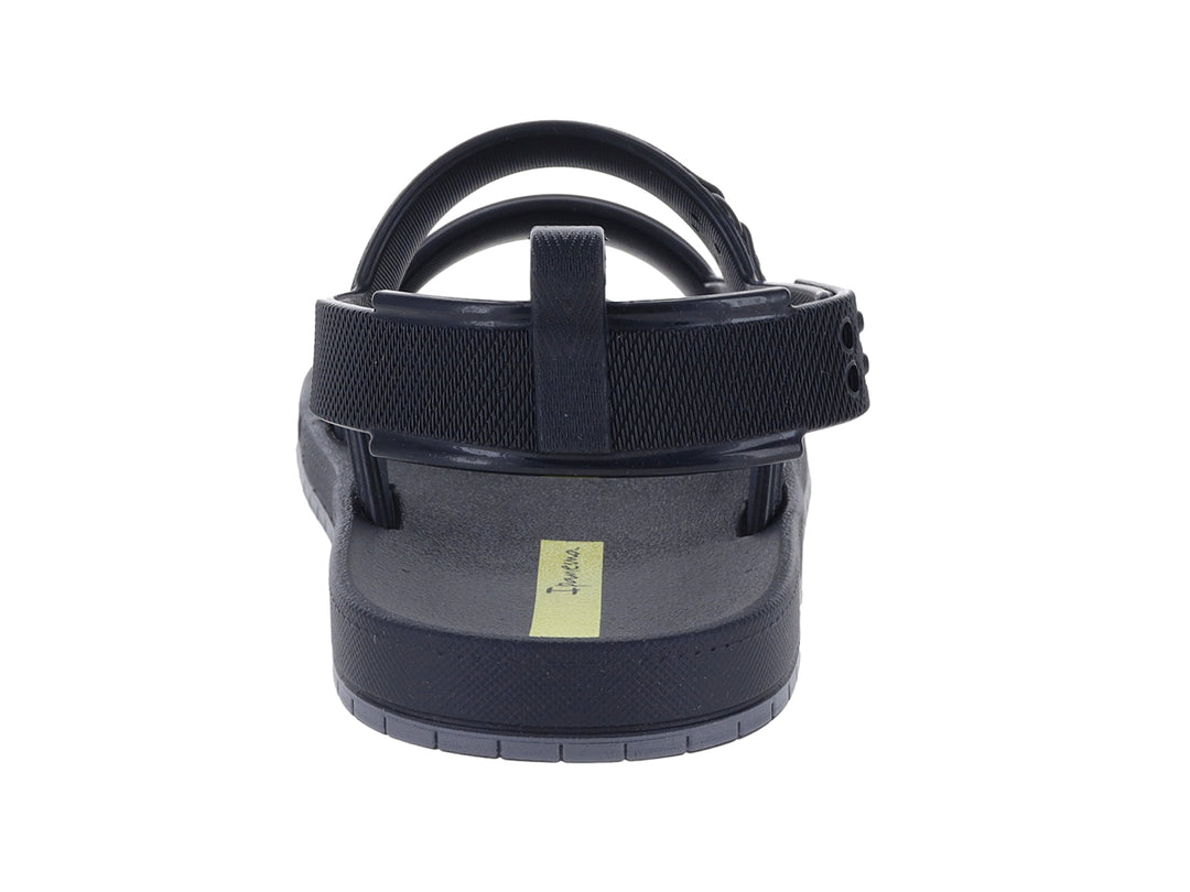 Sandalia infantil Ipanema de color negro con tiras ajustables y detalles amarillos.