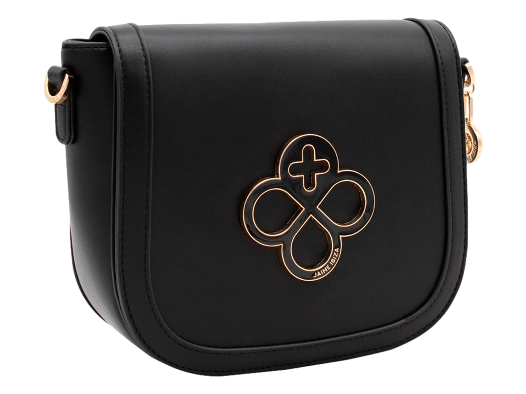Bolso bandolera negro de Jaime Ibiza con herrajes dorados y logo ornamental en el centro.