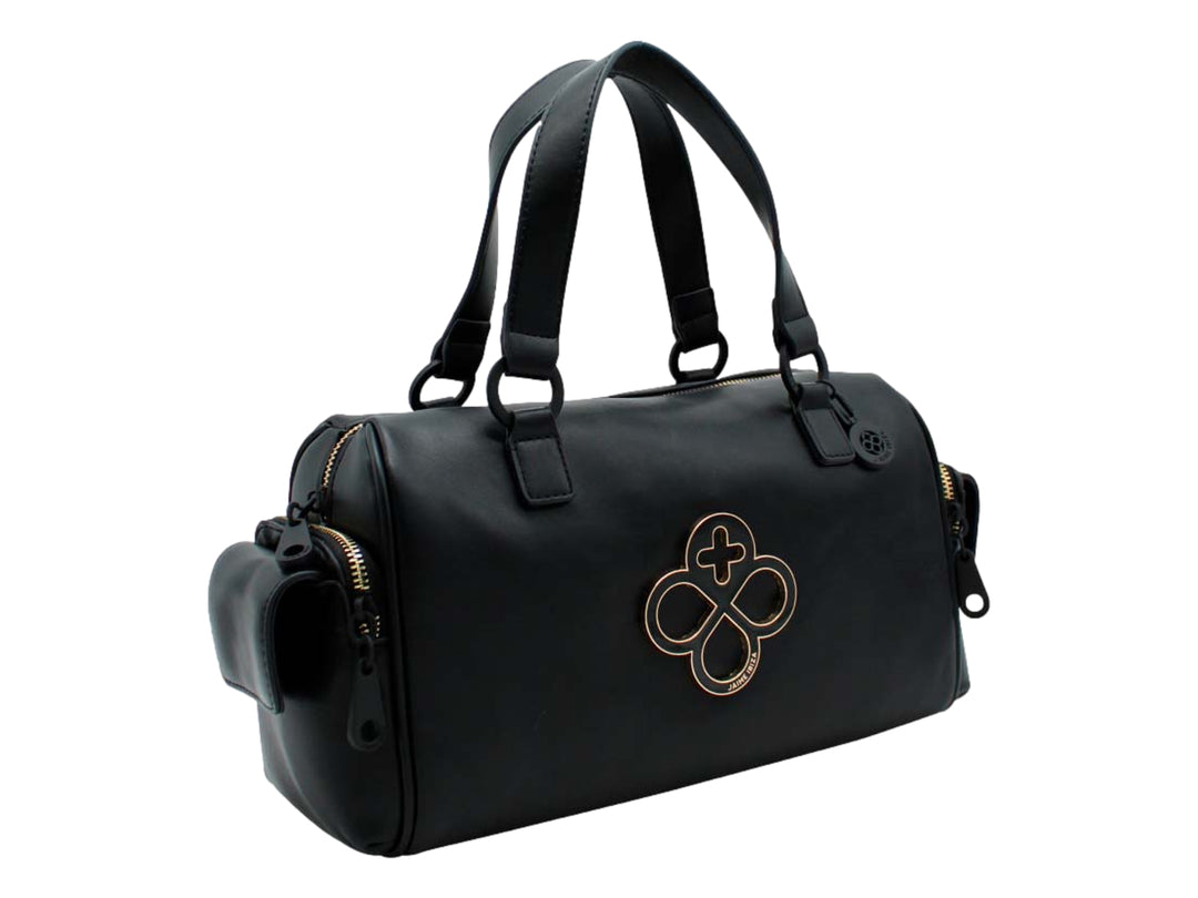 Bolso negro de Jaime Ibiza con asas superiores, correa ajustable y detalle decorativo circular en el frente.