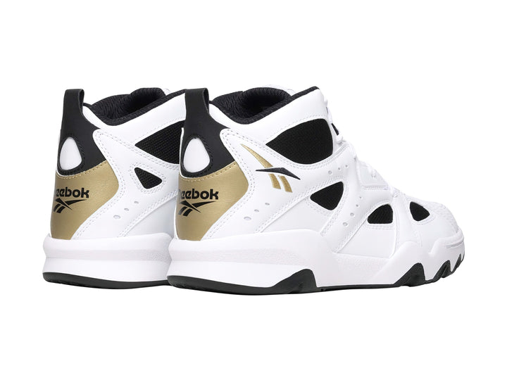 Tenis de baloncesto Reebok ATR Decimator en color blanco con detalles en negro y dorado.