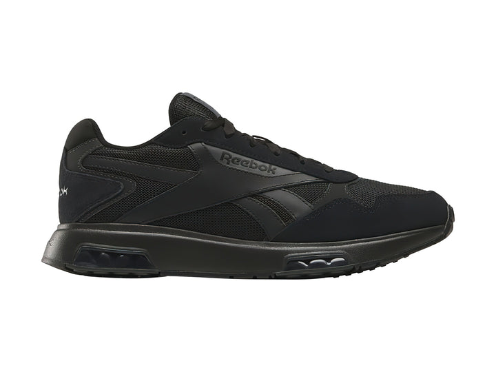 Tenis deportivos Reebok color negro con malla transpirable y suela amortiguada.