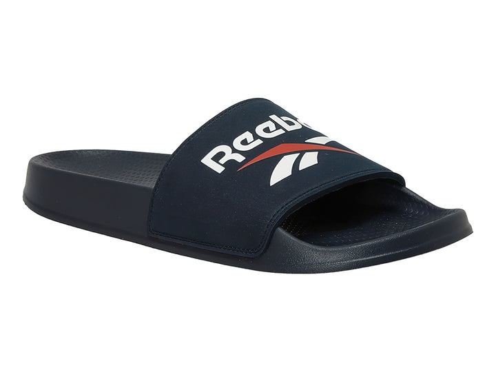 Sandalias Reebok Fulgere Slide en color azul marino con logotipo blanco y rojo en la banda superior.