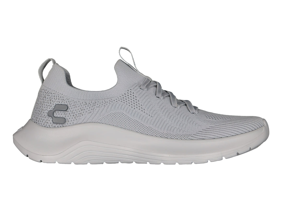 Tenis deportivos Charly de color gris con tejido transpirable y suela cómoda.