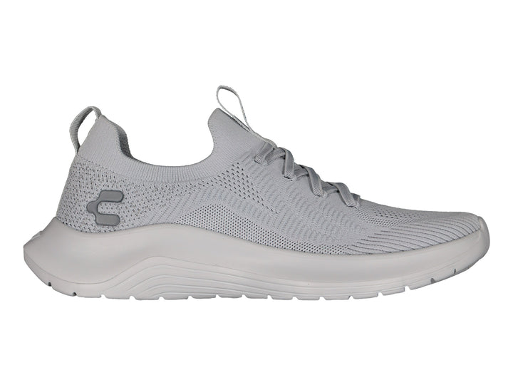 Tenis deportivos Charly de color gris con tejido transpirable y suela cómoda.