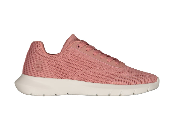 Tenis deportivos Charly de color rosa con suela blanca y tejido transpirable.