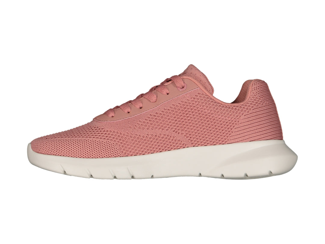 Tenis deportivos Charly de color rosa con suela blanca y tejido transpirable.