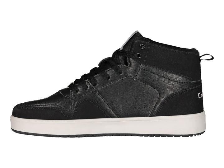 Tenis deportivos Charly de corte medio en color negro con suela blanca.
