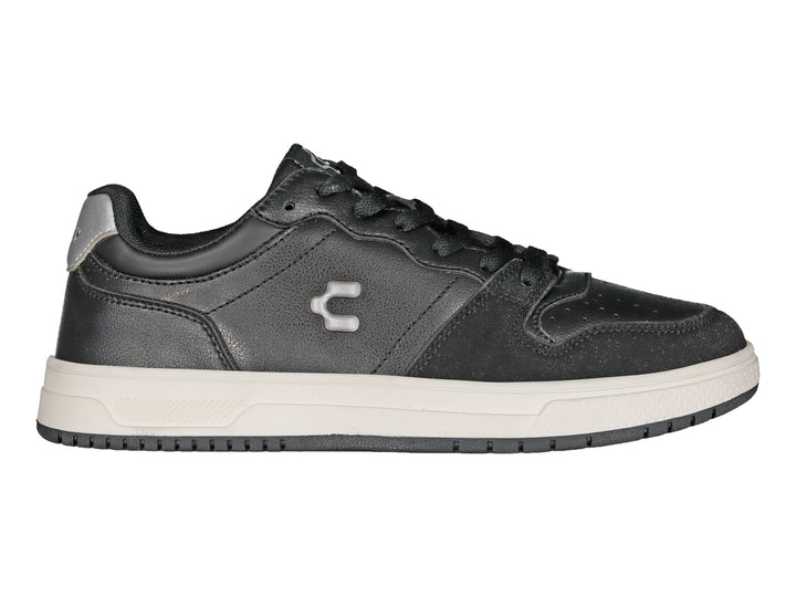 Tenis deportivos Charly color negro con detalles en plata y suela blanca.